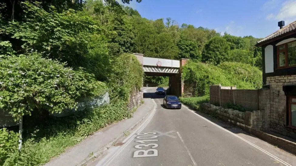Road closed while authorities respond to gas leak
