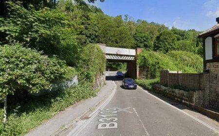 Road closed while authorities respond to gas leak