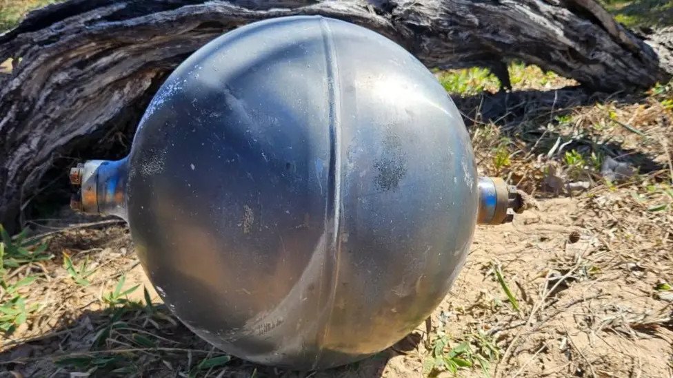 Mystery silver spheres wash up on Australian beach as space debris investigation begins