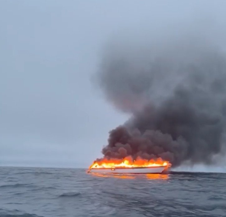 Four rescued after luxury yacht bursts into flames off English coast